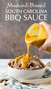 Sc mustard-based barbeque sauce poured over pulled pork