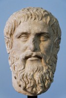 Marble bust of Plato, set against a plain blue background.
