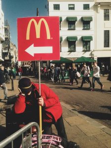 Person holding sign.