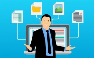 A person in a suit stands in front of a laptop. Above the laptop are four icons connected to it: a spreadsheet, a folder, an image, and a document marked with an "A" grade. The background is blue.
