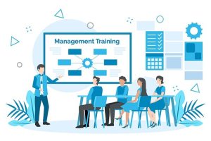 A business training session with a presenter standing in front of a screen labeled "Management Training." Four attendees are seated at a table, facing the presenter and the screen, which displays a flowchart or diagram. The background includes geometric shapes and icons like checklists, gears, and charts.