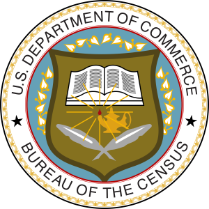 Seal of the United States Census Bureau, part of the Department of Commerce. It has a circular design with a blue and gold color scheme. The outer ring includes the text "DEPARTMENT OF COMMERCE" at the top and "BUREAU OF THE CENSUS" at the bottom, with stars and leaves as decorative elements. The center is blurred and not clearly visible.